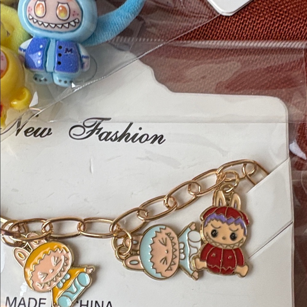 Monster Charm Bracelet & Hair Bands 6 pcs with colorful little monster charms - Picture 4 of 4